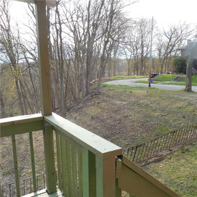 view of yard featuring a balcony