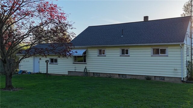 318 Hamburg Rd, Hempfield Twp Mer, PA 16125 - back of property with a lawn, roof with shingles, and a chimney