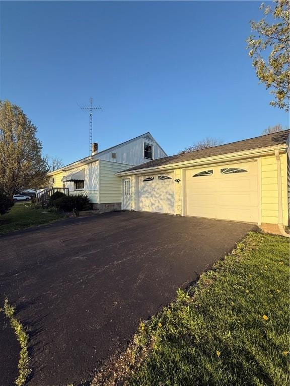 318 Hamburg Rd, Hempfield Twp Mer, PA 16125 - exterior space with an attached garage and aphalt driveway