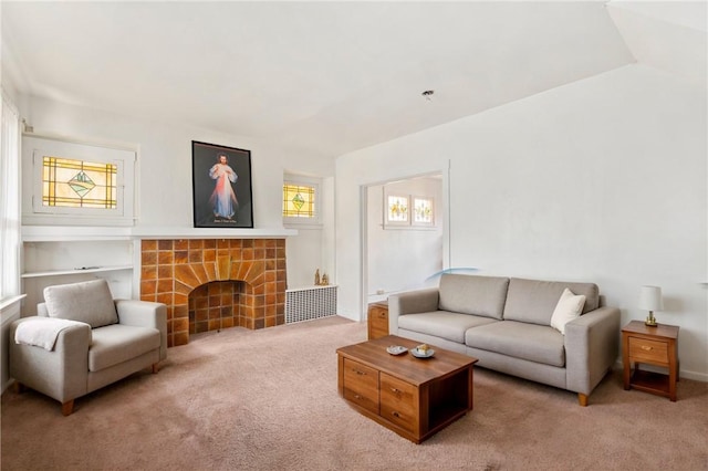 1163 Chislett, Morningside, PA 15206 - carpeted living area featuring a tiled fireplace