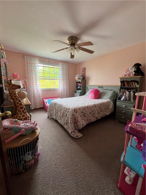 225 Jefferson Ave, Masontown, PA 15461 - carpeted bedroom with ceiling fan