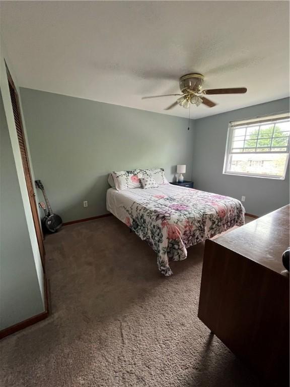 225 Jefferson Ave, Masontown, PA 15461 - carpeted bedroom with a ceiling fan and baseboards