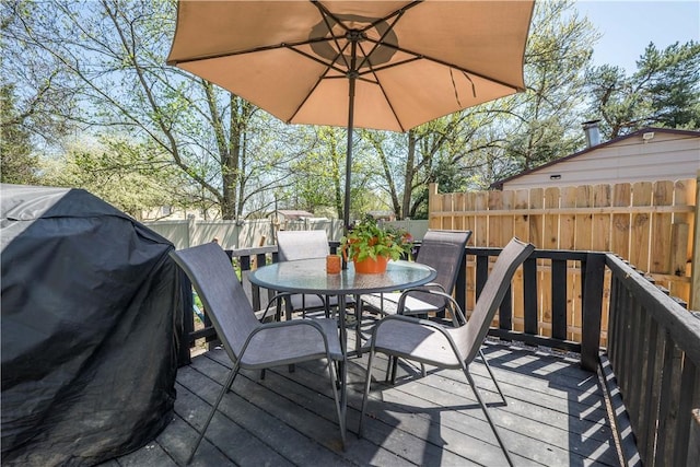 337 Whitestown Rd, Twp Of But Nw, PA 16001 - wooden deck featuring a grill, outdoor dining area, and a fenced backyard