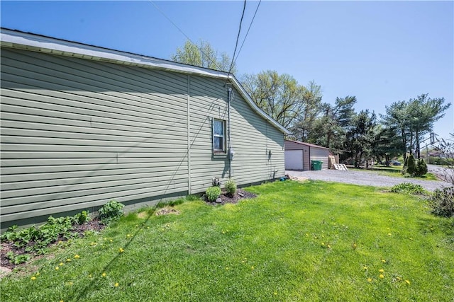 337 Whitestown Rd, Twp Of But Nw, PA 16001 - view of home's exterior featuring a lawn and a detached garage