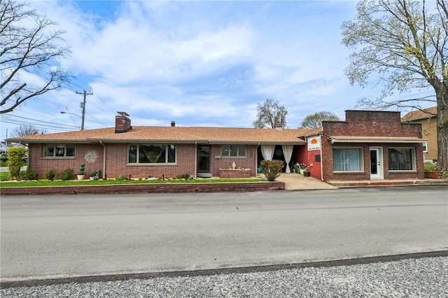2364 Sheffield Rd, Aliquippa, PA 15001 - view of front of home with a chimney and brick siding
