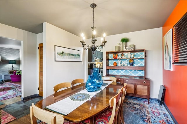 2364 Sheffield Rd, Aliquippa, PA 15001 - dining room with a notable chandelier and baseboards