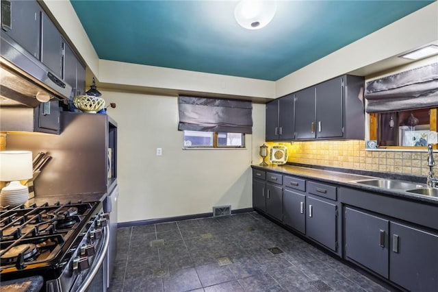 2364 Sheffield Rd, Aliquippa, PA 15001 - kitchen with a sink, tasteful backsplash, visible vents, gas stove, and dark countertops