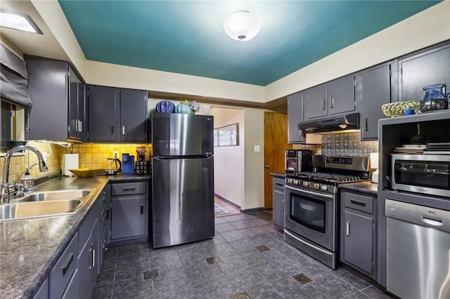 2364 Sheffield Rd, Aliquippa, PA 15001 - kitchen with stainless steel appliances, under cabinet range hood, decorative backsplash, and a sink