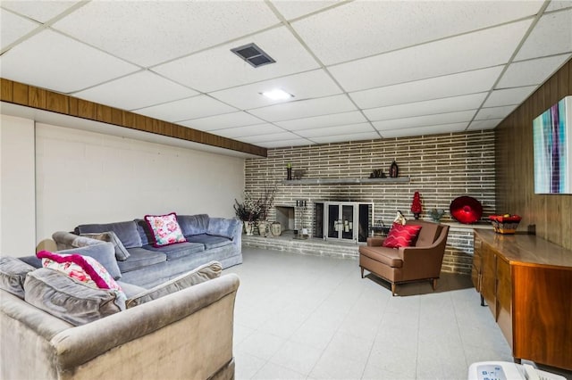 2364 Sheffield Rd, Aliquippa, PA 15001 - living area featuring visible vents, a fireplace, and a paneled ceiling