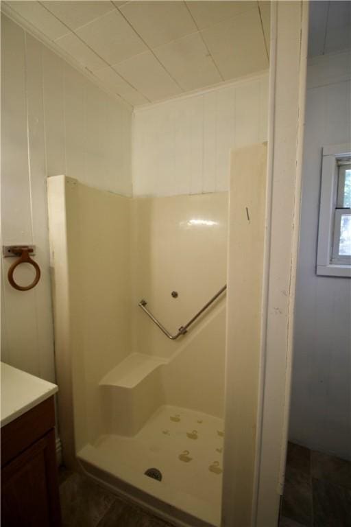 full bath featuring a shower stall and vanity