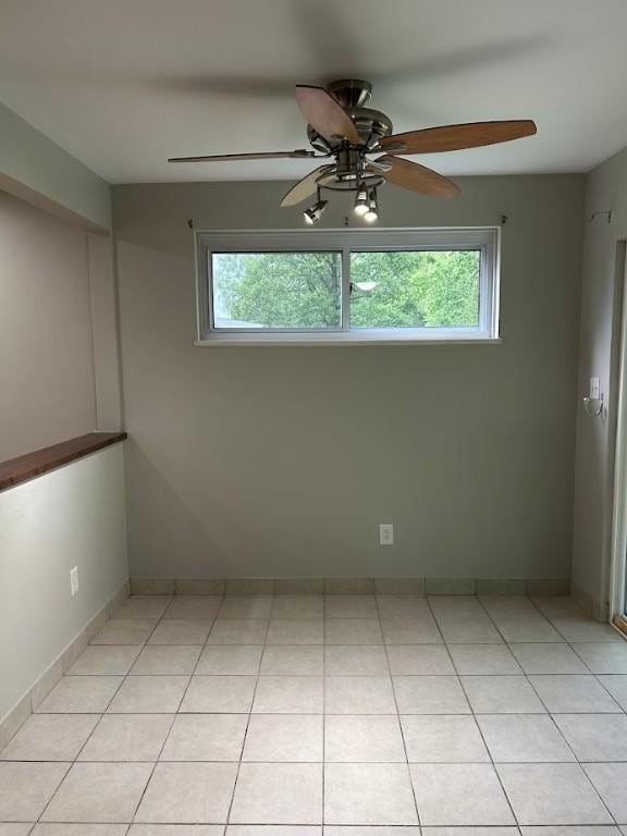 416 Millers Ln, Plum Boro, PA 15239 - empty room featuring ceiling fan, plenty of natural light, and light tile patterned floors
