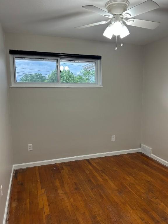 416 Millers Ln, Plum Boro, PA 15239 - spare room with healthy amount of natural light, hardwood / wood-style floors, baseboards, and a ceiling fan