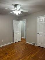 416 Millers Ln, Plum Boro, PA 15239 - unfurnished bedroom featuring baseboards, wood finished floors, and a ceiling fan
