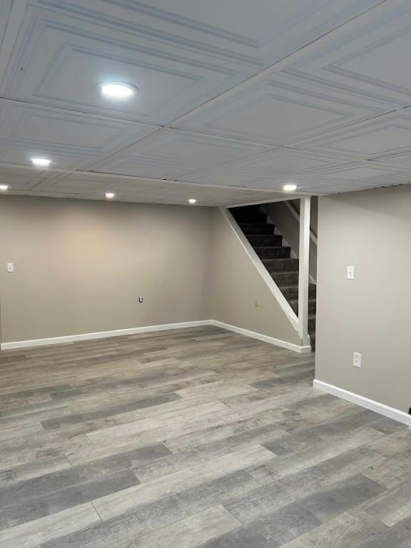 416 Millers Ln, Plum Boro, PA 15239 - finished basement featuring recessed lighting, stairway, baseboards, and wood finished floors