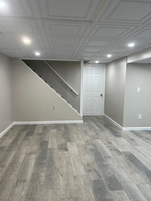 416 Millers Ln, Plum Boro, PA 15239 - finished basement with recessed lighting, baseboards, wood finished floors, an ornate ceiling, and stairs