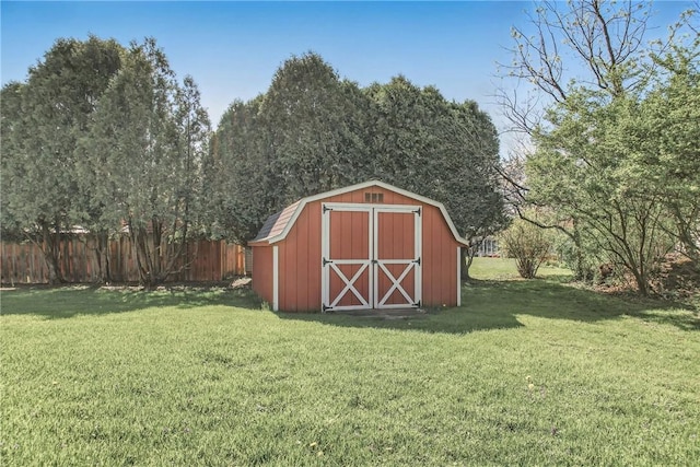 view of shed with fence