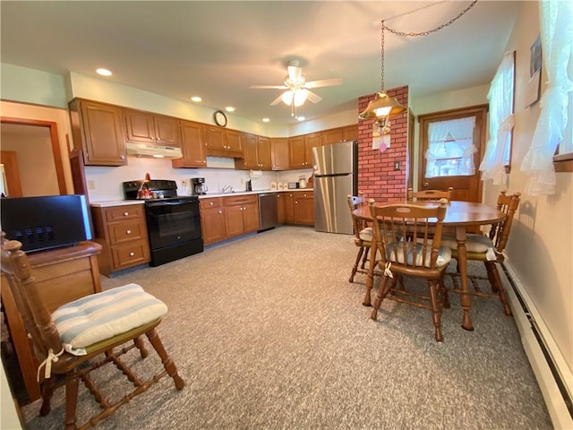 kitchen featuring a baseboard radiator, ceiling fan, under cabinet range hood, black appliances, and light carpet
