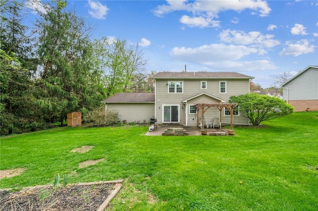 back of house with a yard, a pergola, and a patio