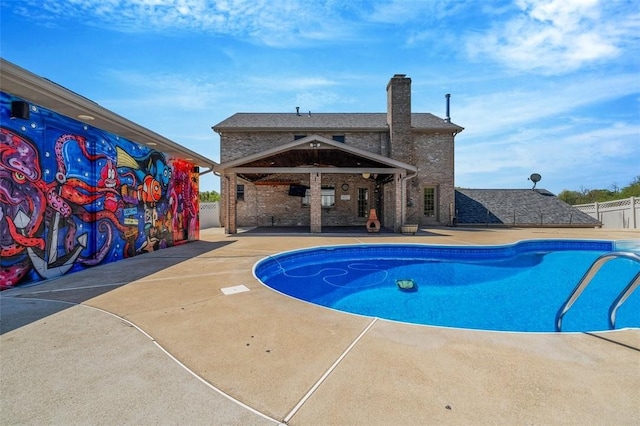 view of pool featuring a patio, fence, a gazebo, and a fenced in pool