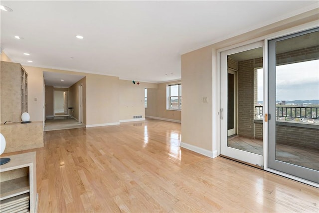 220 N Bellefield Ave Unit 903, Oakland, PA 15213 - unfurnished living room with light wood-style floors, recessed lighting, visible vents, and baseboards