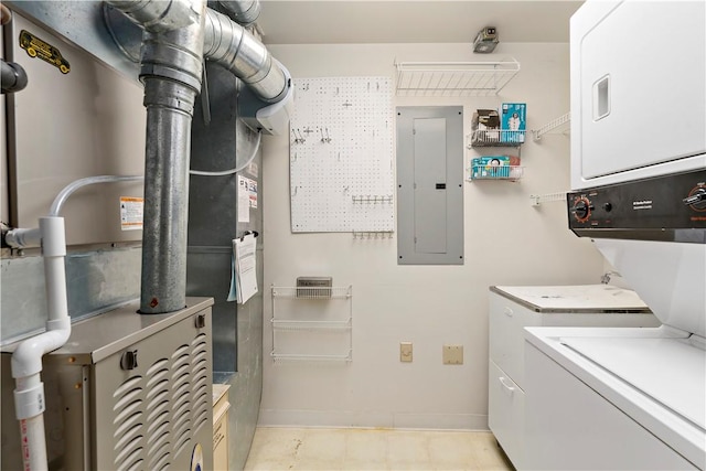 220 N Bellefield Ave Unit 903, Oakland, PA 15213 - clothes washing area with heating unit, electric panel, stacked washer and clothes dryer, laundry area, and baseboards