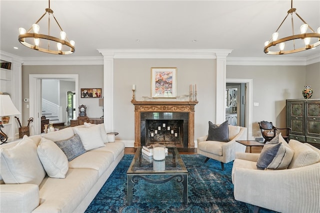 743 Chestnut Rd, Edgeworth, PA 15143 - living room with an inviting chandelier, a premium fireplace, and crown molding