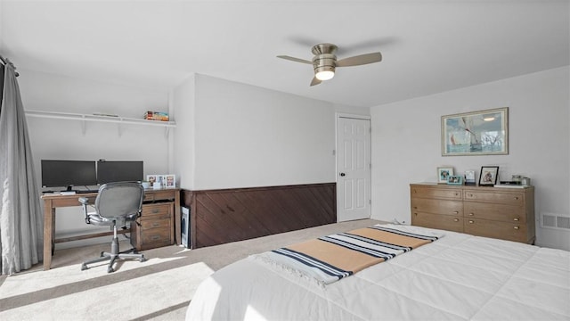 bedroom featuring carpet, visible vents, and a ceiling fan