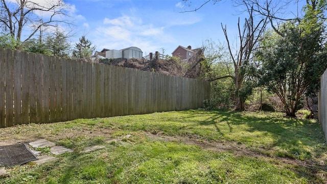 view of yard featuring fence