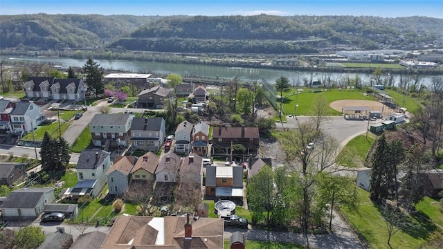 aerial view with a residential view and a water view