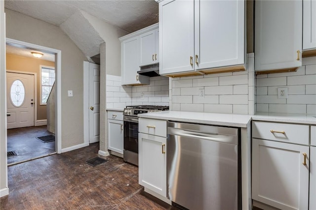 kitchen featuring backsplash, white cabinets, appliances with stainless steel finishes, and under cabinet range hood