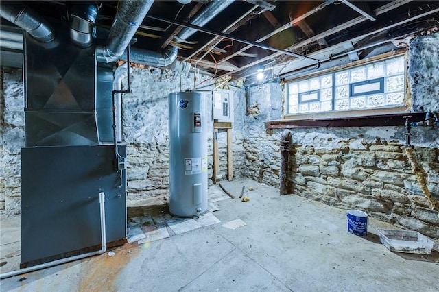 basement with heating unit, water heater, and electric panel