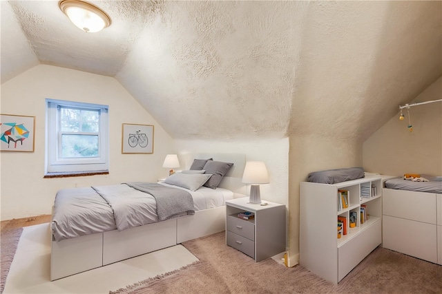 bedroom featuring carpet floors, a textured ceiling, and vaulted ceiling