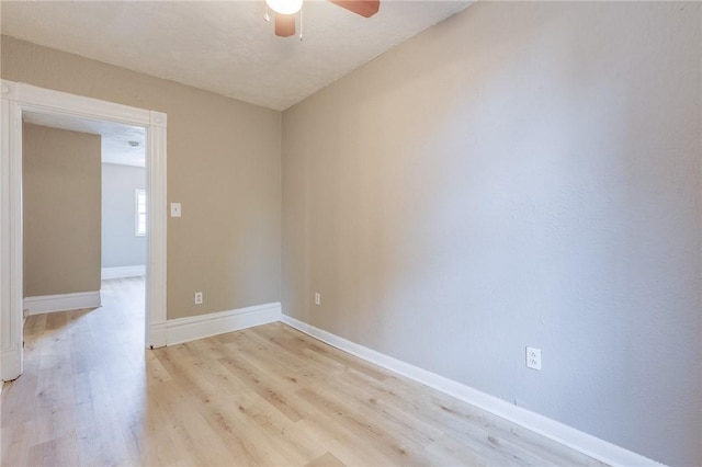 1226 Woodland Ave, Marshall Shadeland, PA 15212 - empty room with a ceiling fan, light wood finished floors, and baseboards