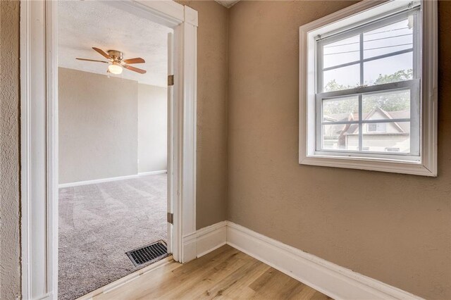 1226 Woodland Ave, Marshall Shadeland, PA 15212 - empty room with baseboards, light wood-type flooring, and ceiling fan