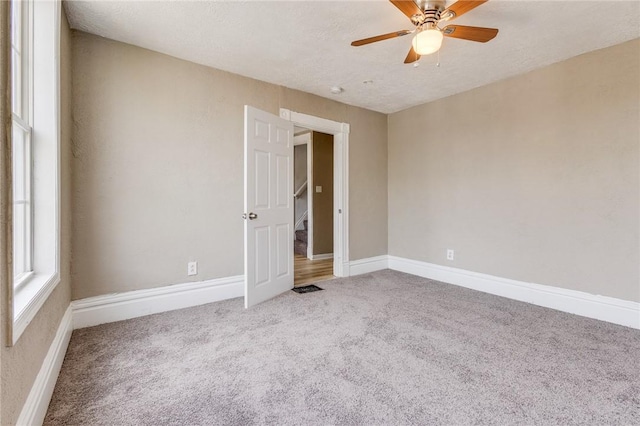 1226 Woodland Ave, Marshall Shadeland, PA 15212 - carpeted spare room featuring a ceiling fan and baseboards