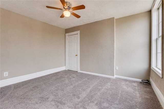 1226 Woodland Ave, Marshall Shadeland, PA 15212 - carpeted spare room featuring a ceiling fan, baseboards, and a textured ceiling
