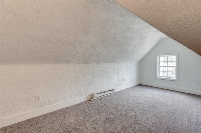 1226 Woodland Ave, Marshall Shadeland, PA 15212 - bonus room featuring a textured ceiling, baseboard heating, carpet floors, vaulted ceiling, and a textured wall
