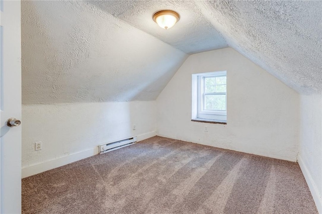 1226 Woodland Ave, Marshall Shadeland, PA 15212 - additional living space featuring a baseboard heating unit, a textured ceiling, carpet, and vaulted ceiling