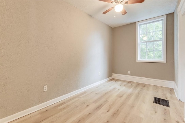 1226 Woodland Ave, Marshall Shadeland, PA 15212 - spare room with wood finished floors, baseboards, and ceiling fan