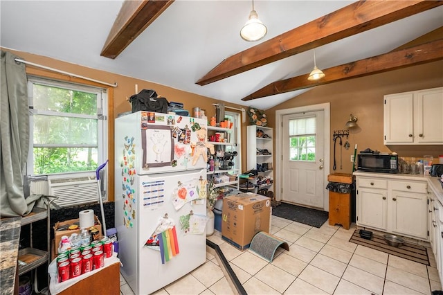 934 W W Rdg, Sharpsville, PA 16150 - kitchen with freestanding refrigerator, black microwave, light tile patterned flooring, white cabinetry, and decorative light fixtures