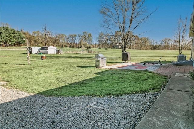 240 Hamburg Rd, Hempfield Twp Mer, PA 16125 - view of home's community with a lawn, a storage unit, an outdoor structure, and a patio area