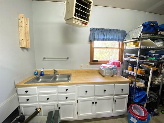 240 Hamburg Rd, Hempfield Twp Mer, PA 16125 - interior space with a sink, a heating unit, white cabinets, and light countertops