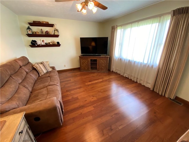 240 Hamburg Rd, Hempfield Twp Mer, PA 16125 - living room featuring baseboards, a ceiling fan, wood finished floors, and visible vents