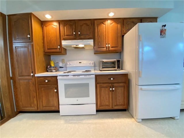 240 Hamburg Rd, Hempfield Twp Mer, PA 16125 - kitchen with white appliances, brown cabinets, under cabinet range hood, and a toaster