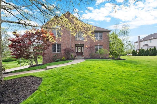 302 Castanea Dr, Cranberry Twp, PA 16066 - view of front of home featuring brick siding and a front lawn