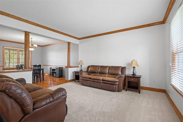 302 Castanea Dr, Cranberry Twp, PA 16066 - living area with crown molding, ornate columns, baseboards, and carpet