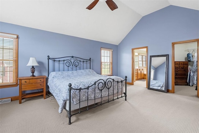 302 Castanea Dr, Cranberry Twp, PA 16066 - bedroom with a walk in closet, carpet, vaulted ceiling, and visible vents
