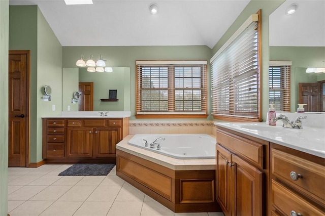 302 Castanea Dr, Cranberry Twp, PA 16066 - full bathroom with tile patterned flooring, vaulted ceiling, two vanities, a sink, and a whirlpool tub