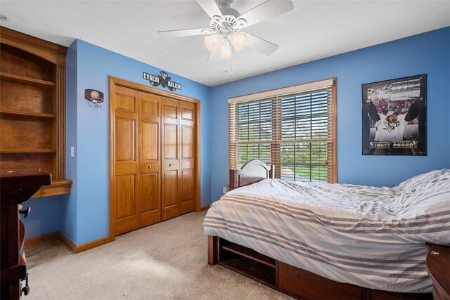 302 Castanea Dr, Cranberry Twp, PA 16066 - bedroom with baseboards, ceiling fan, carpet, and a closet