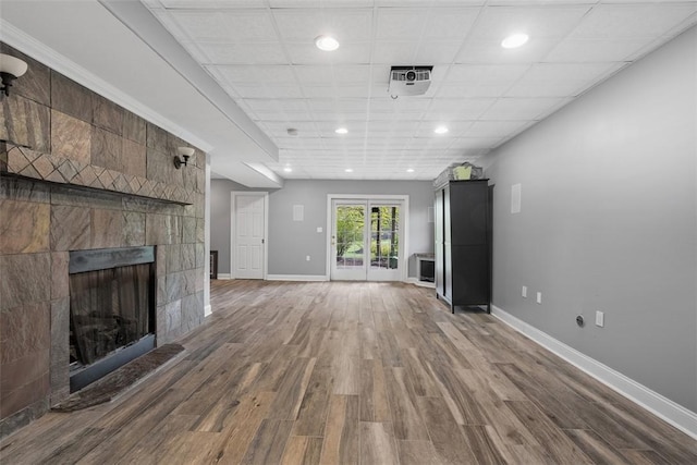 302 Castanea Dr, Cranberry Twp, PA 16066 - unfurnished living room featuring recessed lighting, baseboards, a fireplace, and dark wood-style flooring